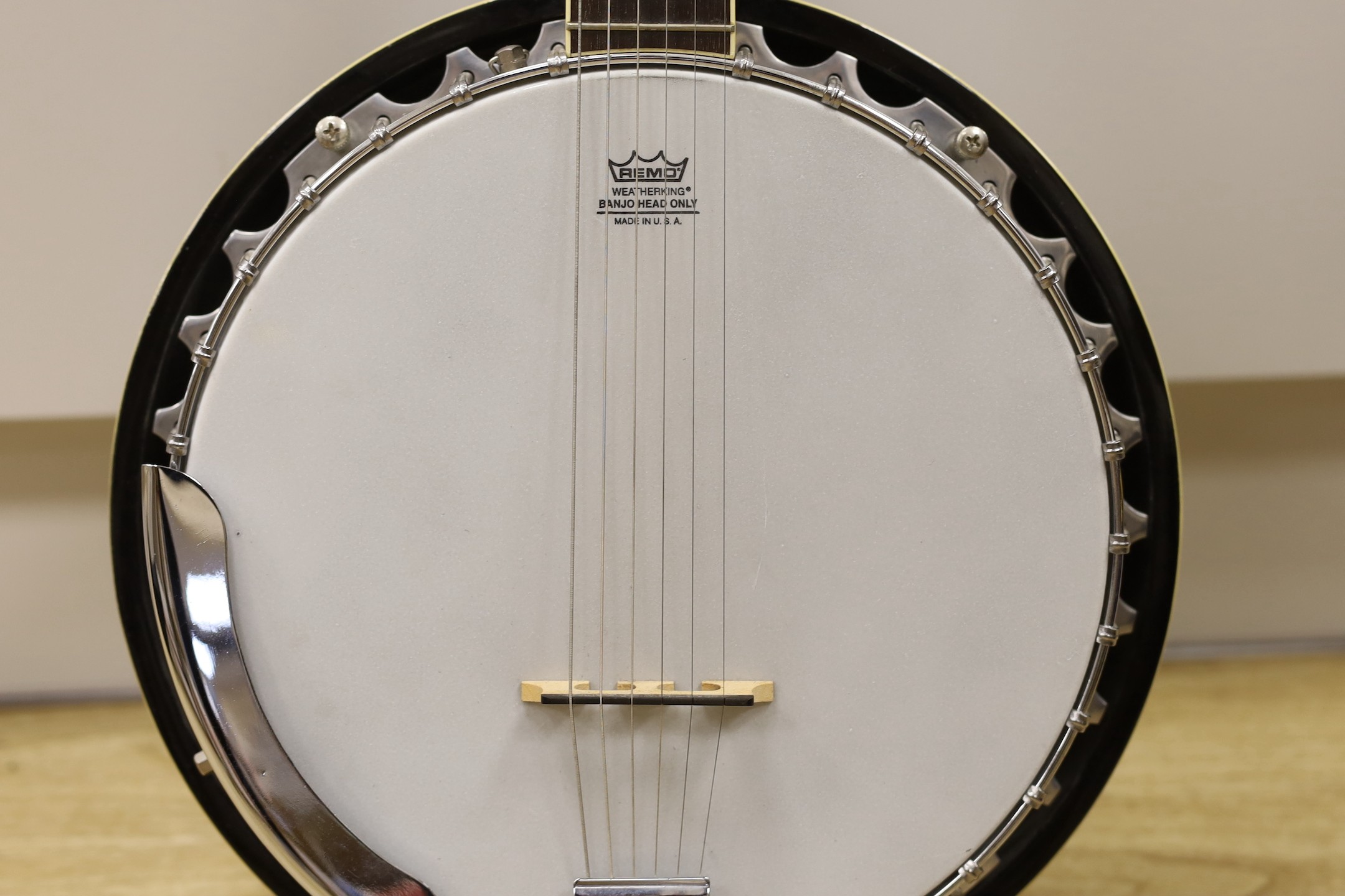 An Ashbury banjo - U.S.A. Weatherking with soft padded case, Banjo 86.5 cms high